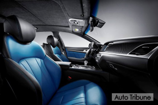 Illustration for article titled Genesis G80 Sport, The Blue Seated Carbon Fiber Trimmed Gold Stiched Steering Wheel Twin-Turbo Sedan All Three Of Us Have Been Waiting For...